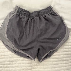 NIKE woman’s athletic shorts. Size small. Color- heather grey.